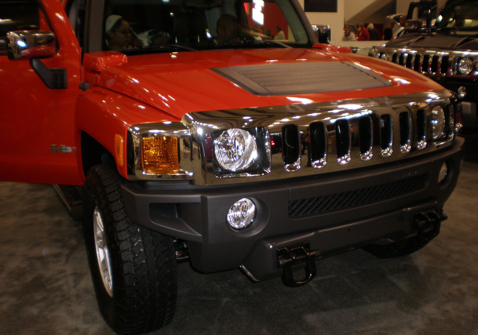 Red 2009 Hummer H3T Crew Cab Alpha pickup, front view