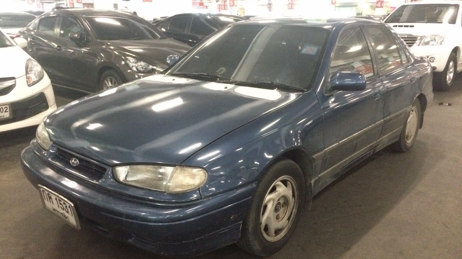 1993 Hyundai Elantra (J1) — 1.8 GT sedan, front three-quarter view