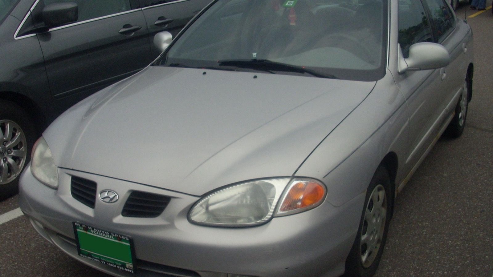1998 Hyundai Elantra — sedan, front three-quarter view