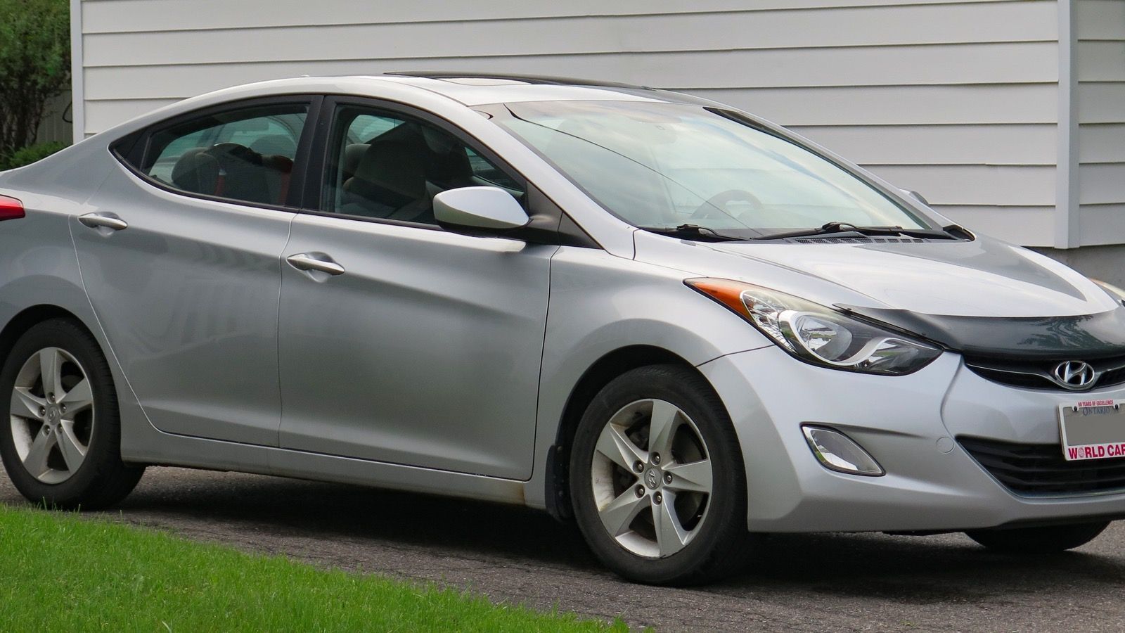 2011 Hyundai Elantra — GLS in Radiant Silver, front three-quarter view