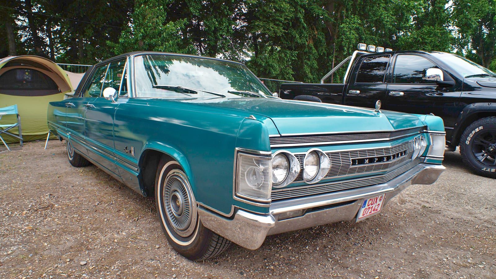 Turquoise 1967 Imperial hardtop, front three-quarter view.