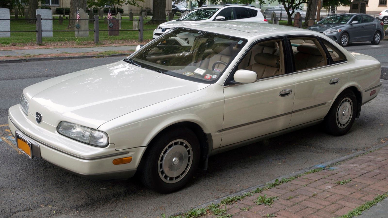 1993 Infiniti Q45 sedan in beige, front left view