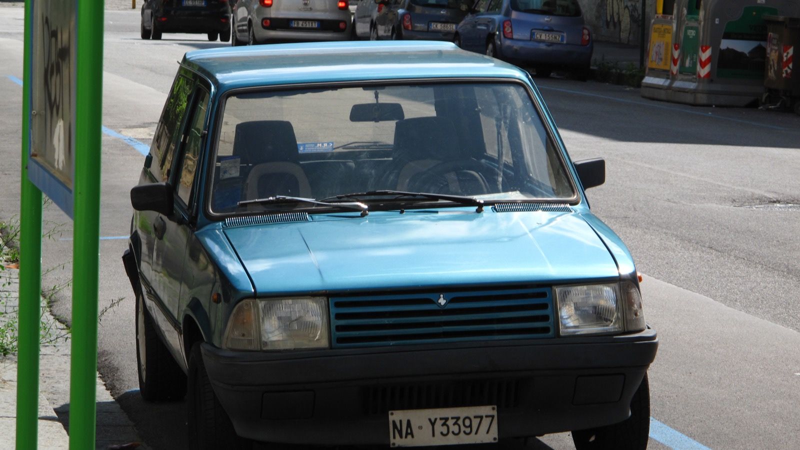 Light blue 1993 Innocenti Small 500 parked on a Naples street, front three-quarter view