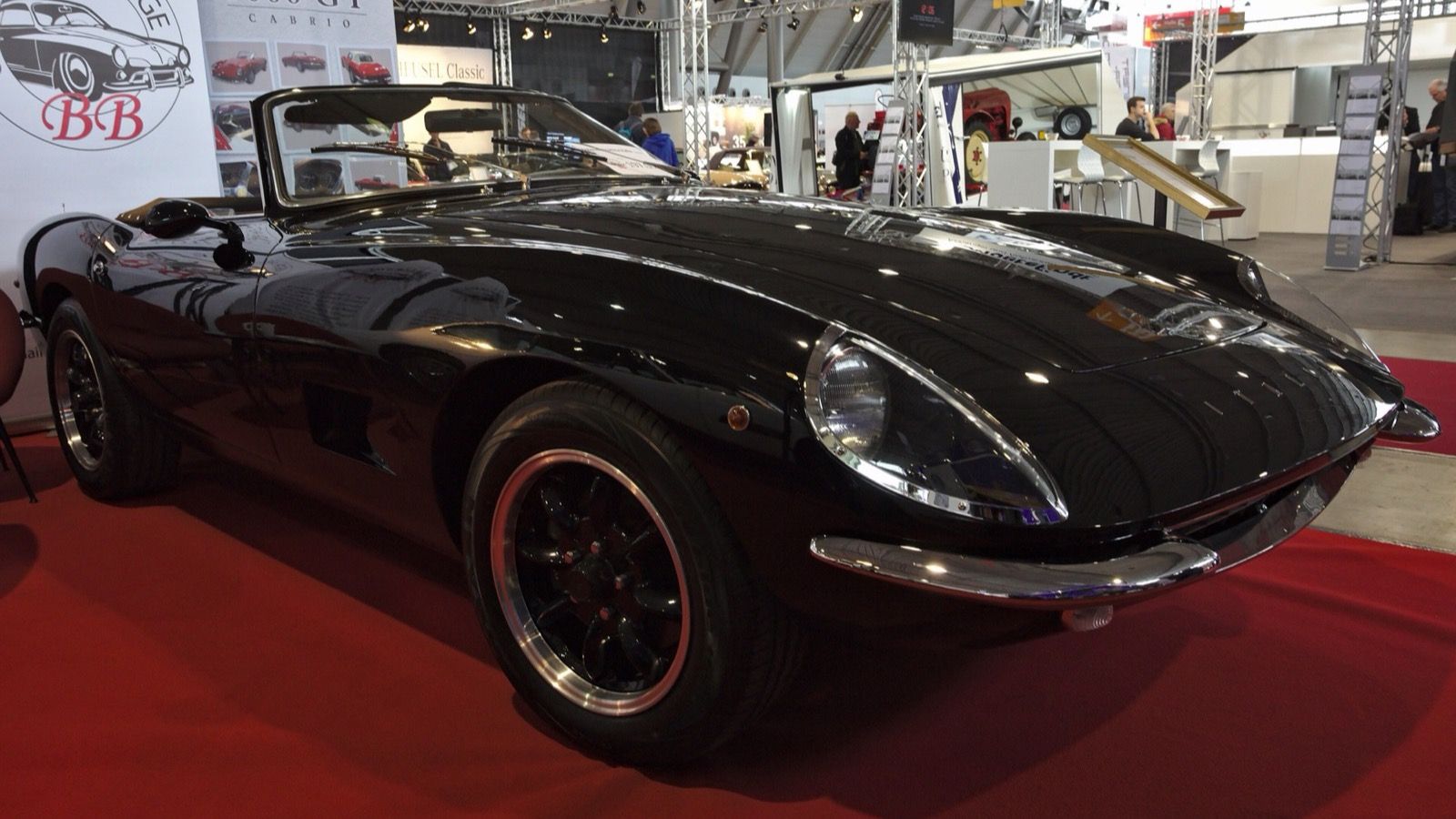 1971 Intermeccanica Italia Spyder in black, front three-quarter view