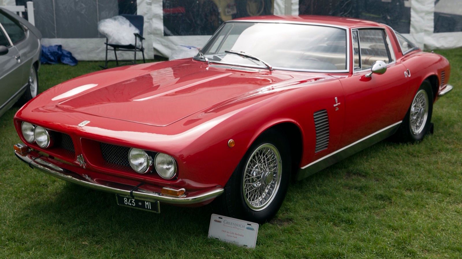 Red 1969 Iso Grifo berlinetta with wire wheels, front three-quarter view