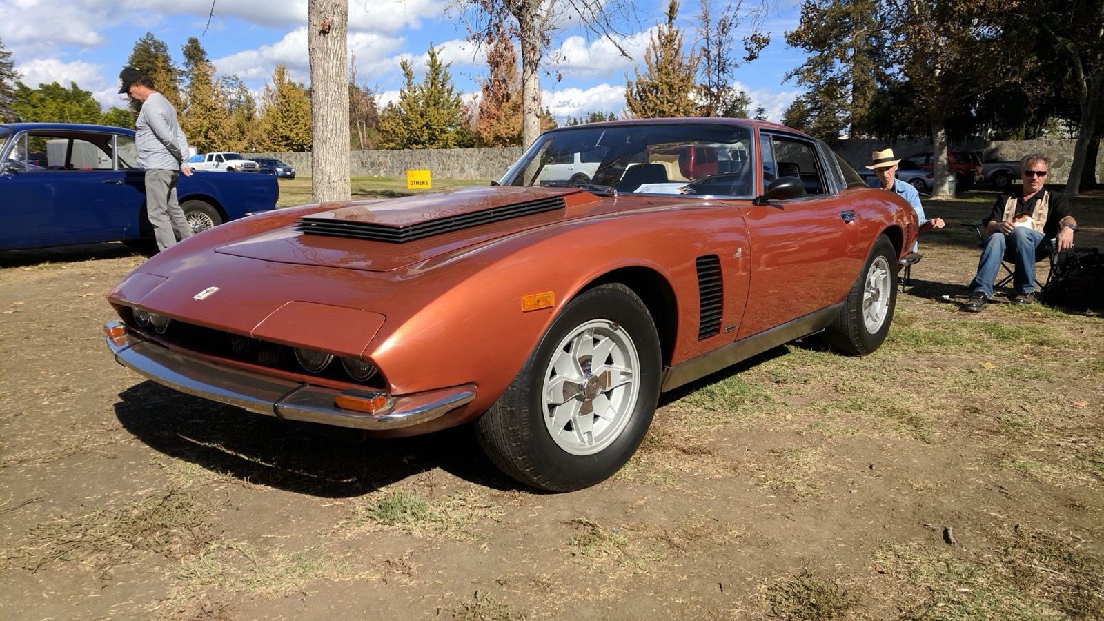 Copper-brown 1974 Iso Grifo with bonnet scoop, front three-quarter view