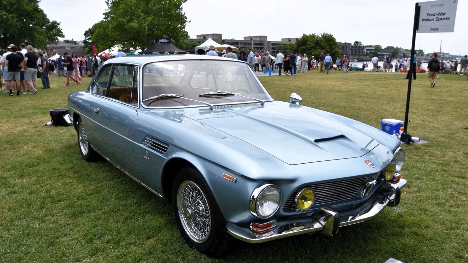 Light-blue Iso Rivolta IR 300 coupe with wire wheels, front three-quarter view