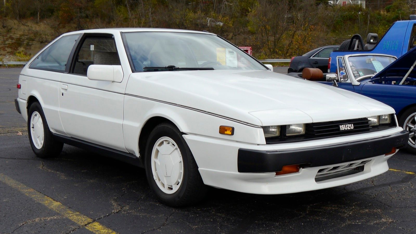 White 1987 Isuzu Impulse RS Turbo coupe, front three-quarter view