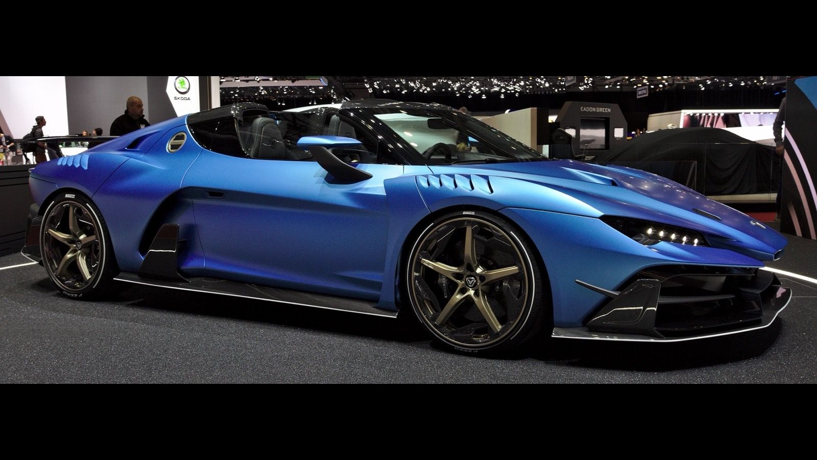 Blue Italdesign Zerouno Duerta roadster on the Geneva Motor Show stand, side profile