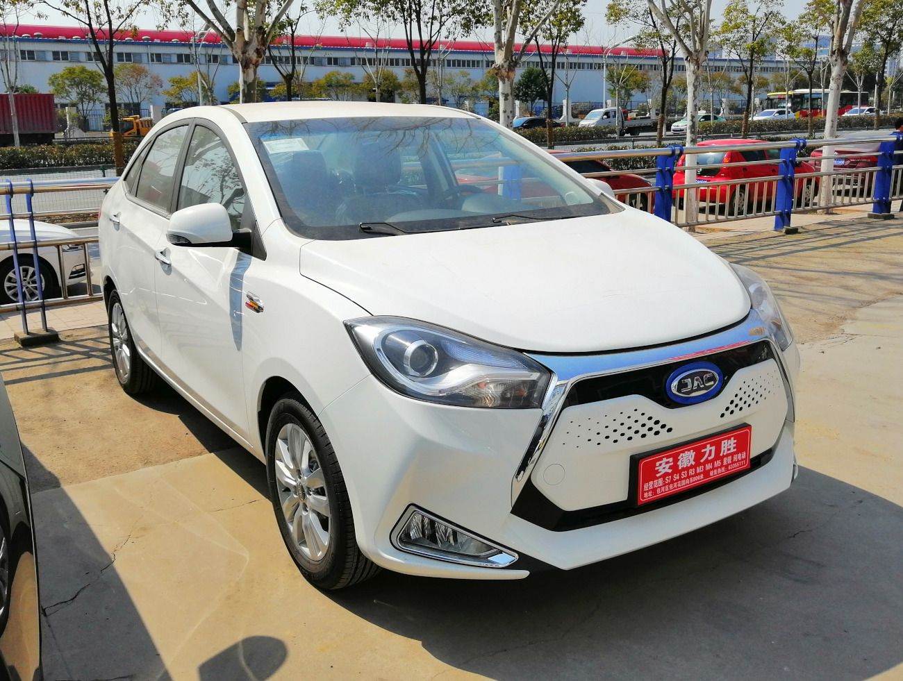 2019 JAC iEV7 electric sedan at a Chinese auto show
