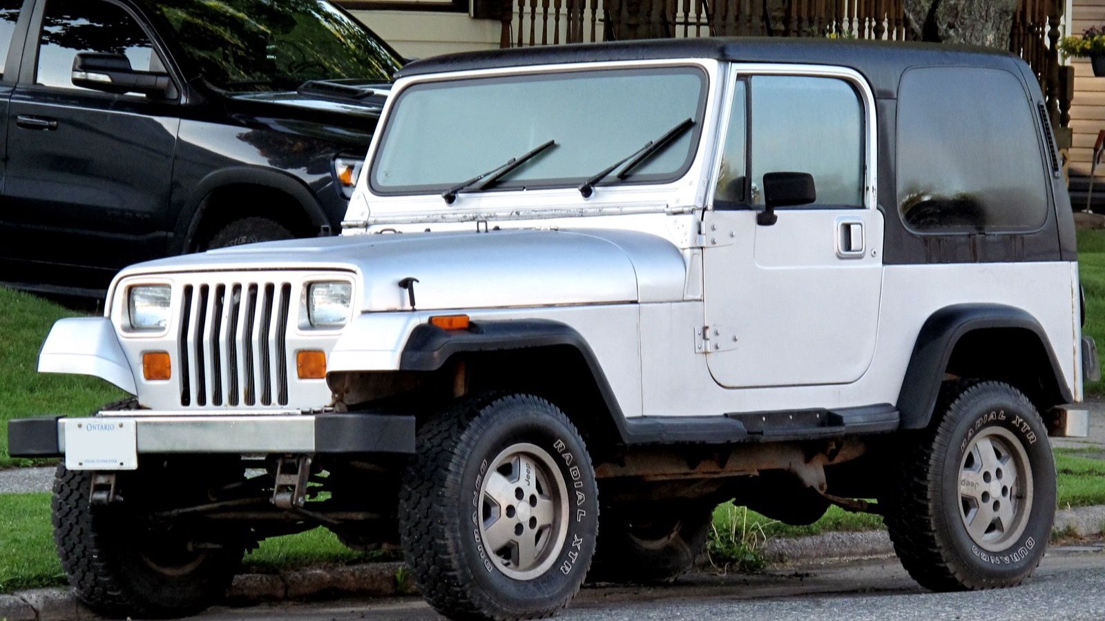 1991 Jeep Wrangler YJ in silver, front three-quarter view