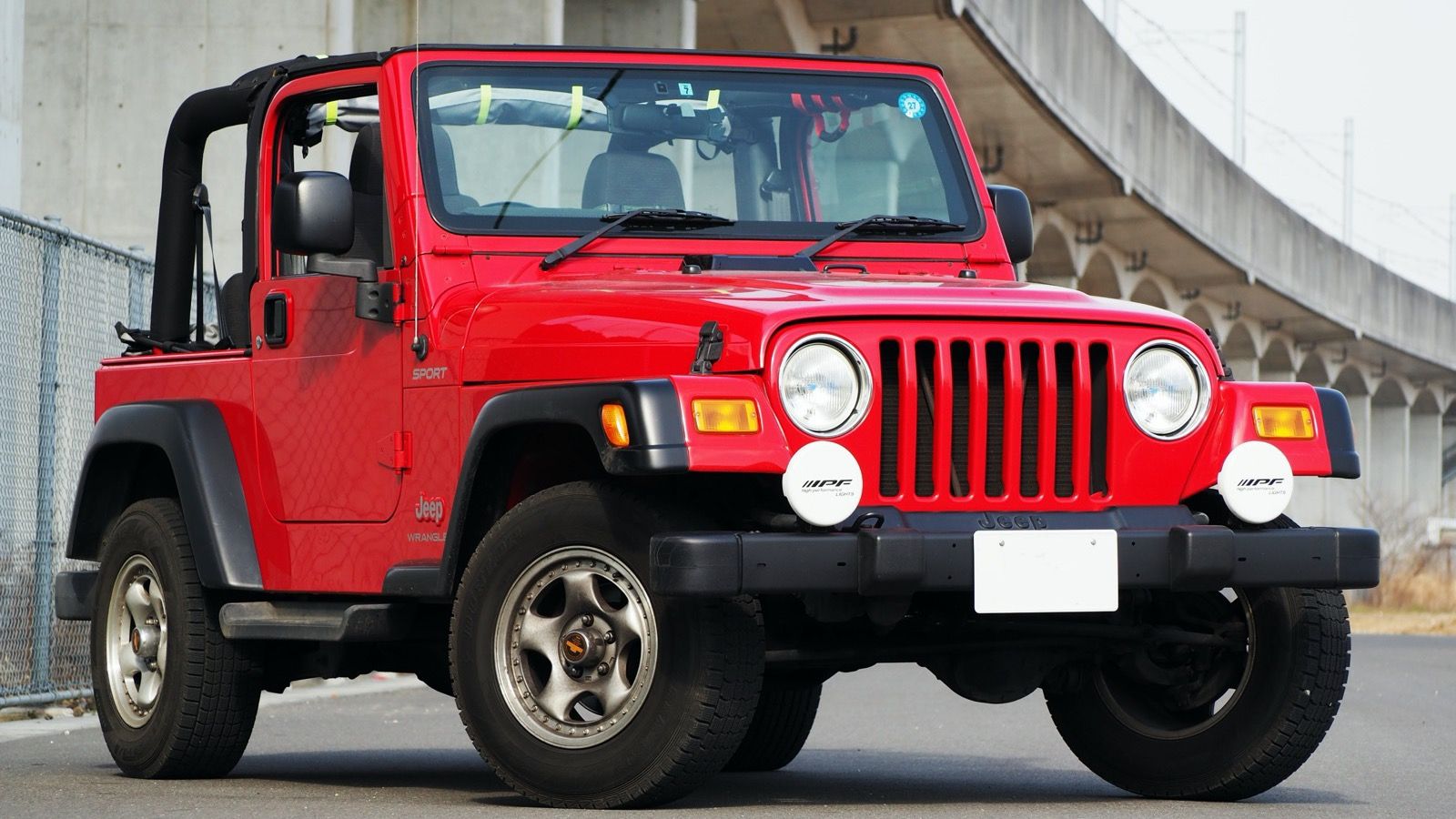 2003 Jeep Wrangler TJ Sport, front three-quarter view