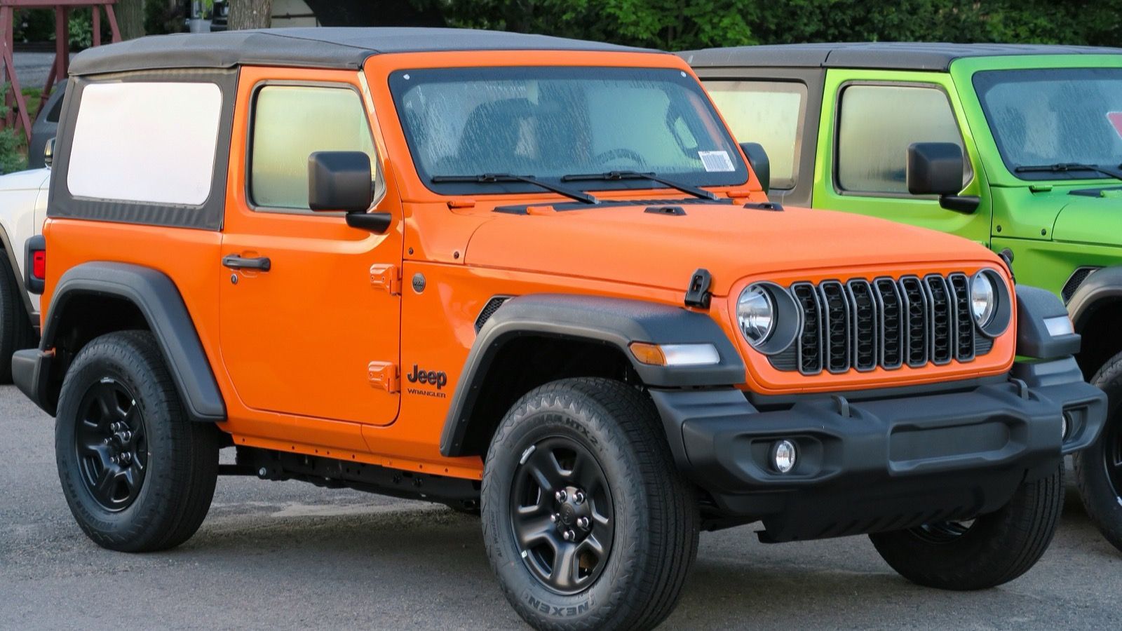 2025 Jeep Wrangler JL two-door Sport, front three-quarter view