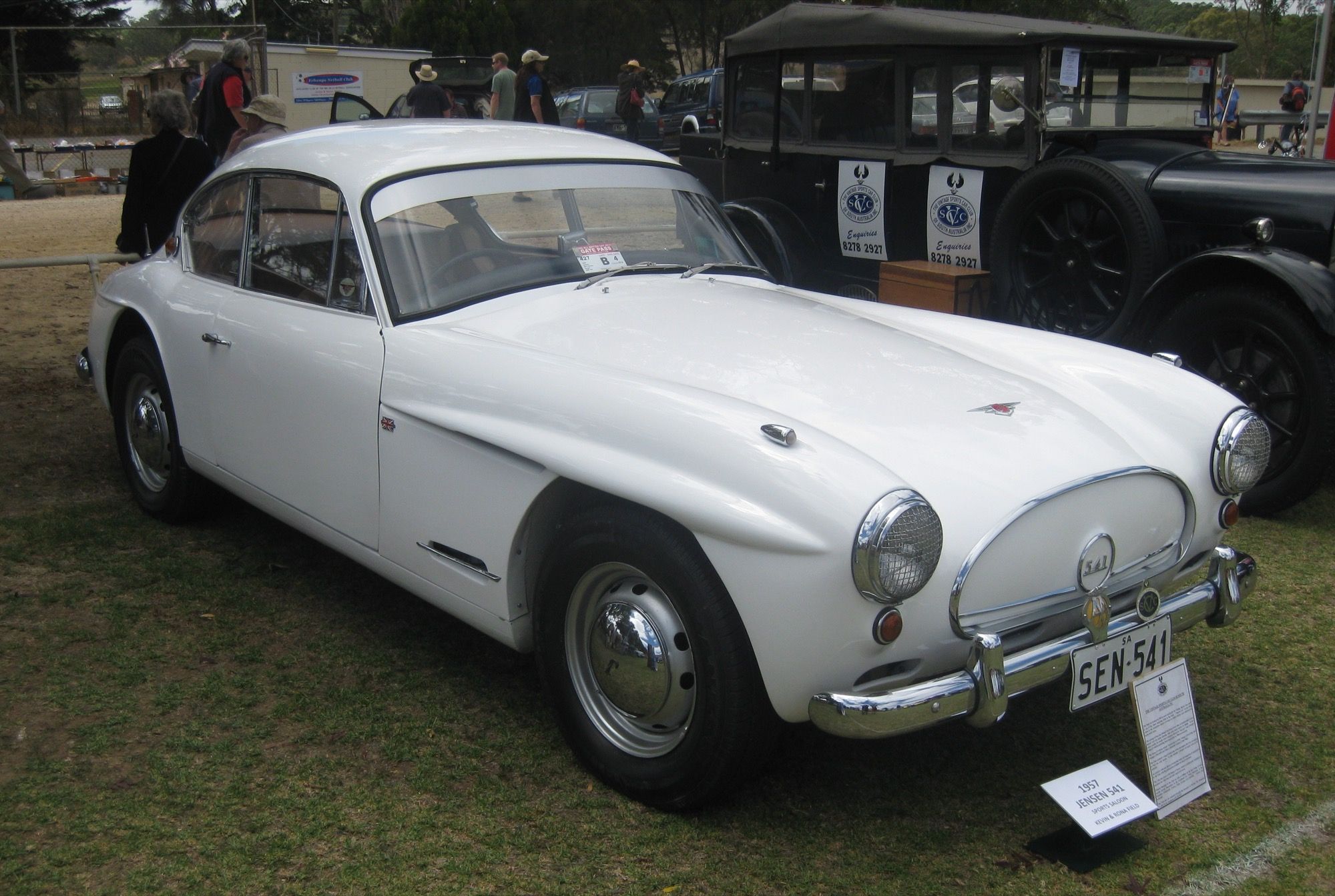 White 1957 Jensen 541 Deluxe coupé on display, front three-quarter view