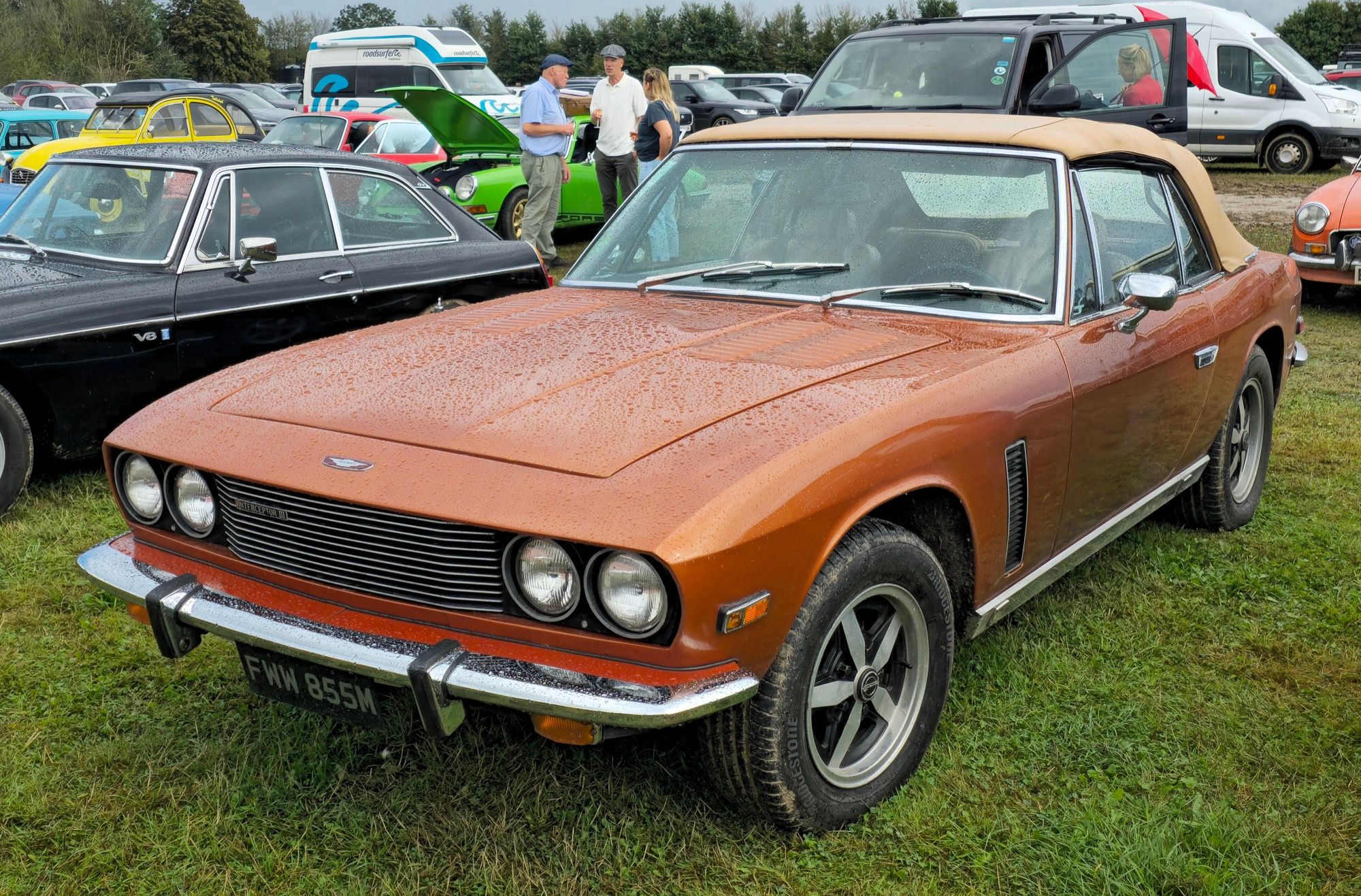 Copper 1974 Jensen Interceptor Mark III Convertible with the hood raised, front three-quarter view