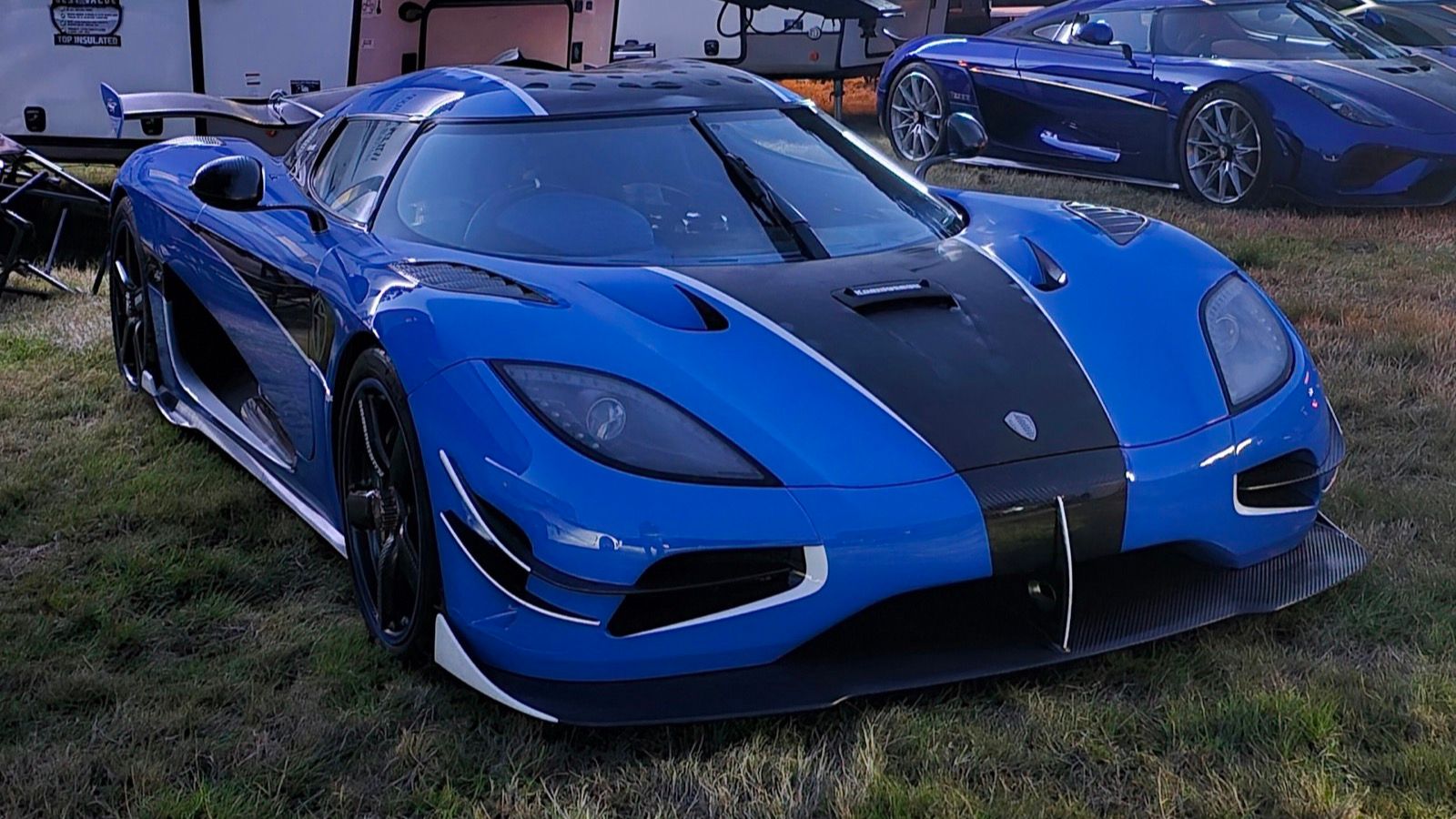 Blue 2018 Koenigsegg Agera RS Thor with exposed carbon fibre centre stripe, front three-quarter view