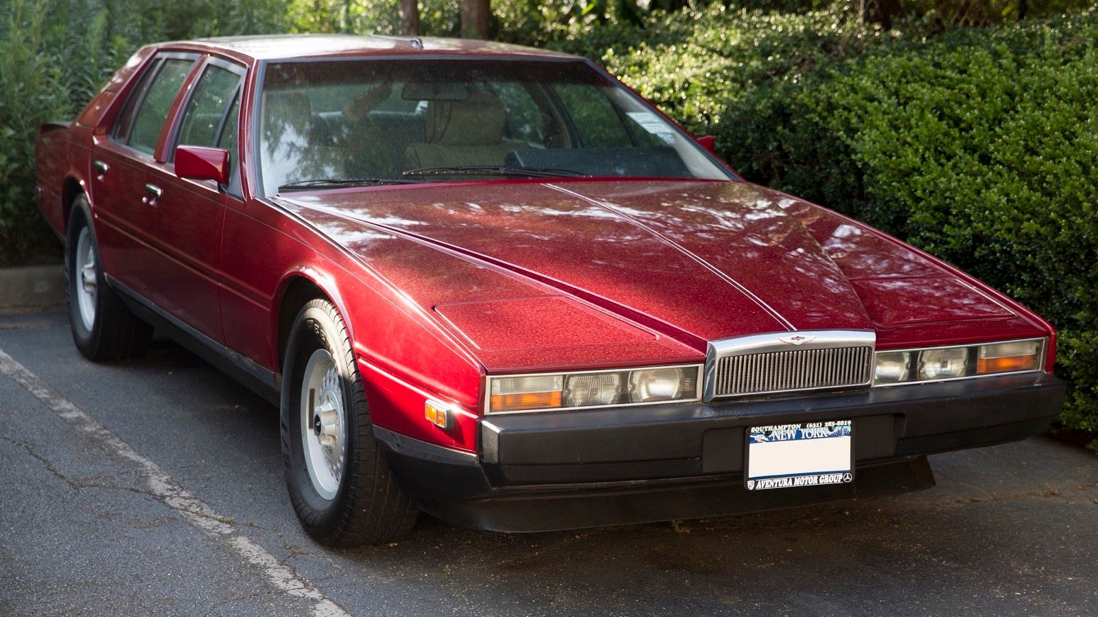 Dark red 1984 Aston Martin Lagonda Series 2 saloon, front three-quarter view