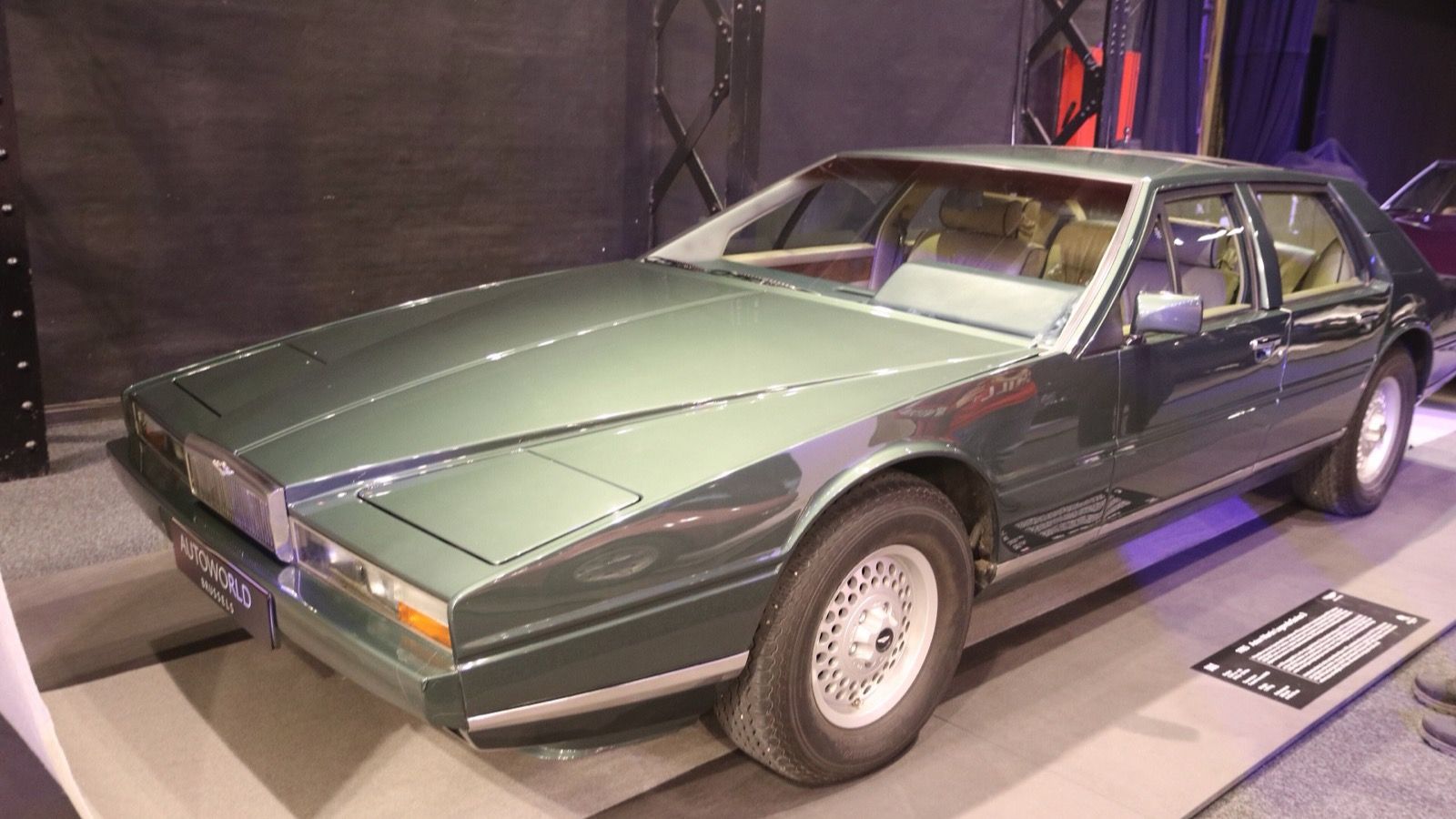 Green 1985 Aston Martin Lagonda wedge saloon on museum display, front three-quarter view