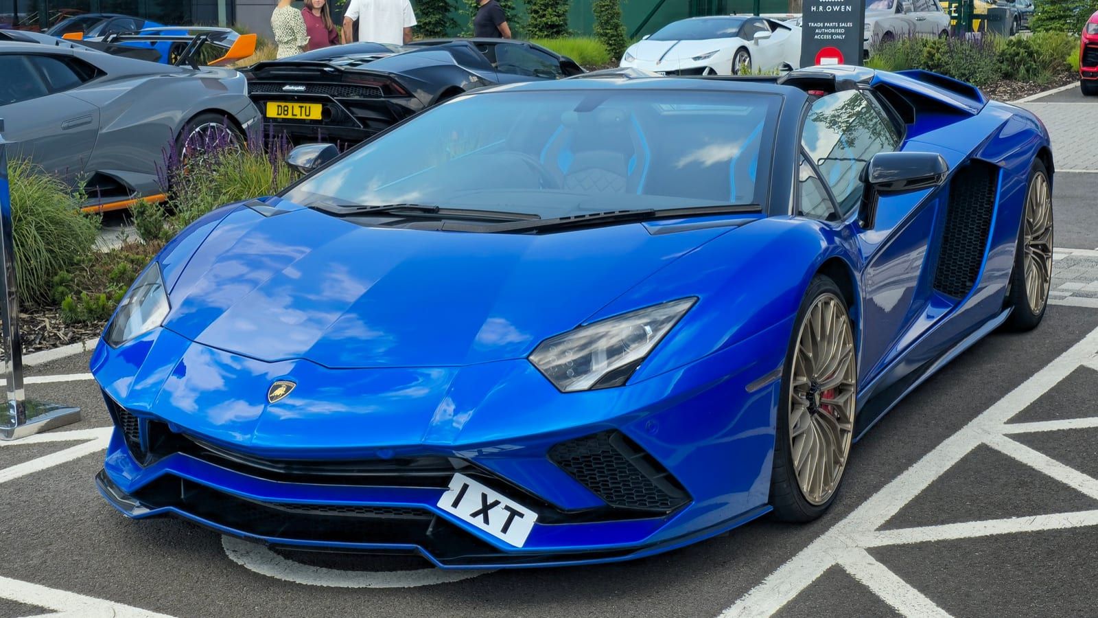 Blue 2019 Lamborghini Aventador S Roadster, front three-quarter view