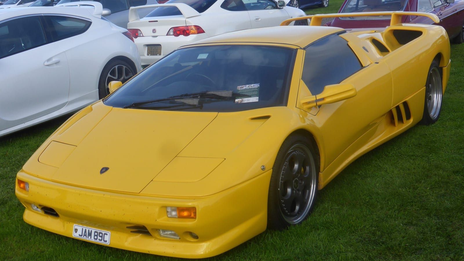 Yellow 1997 Lamborghini Diablo VT Roadster, front three-quarter view