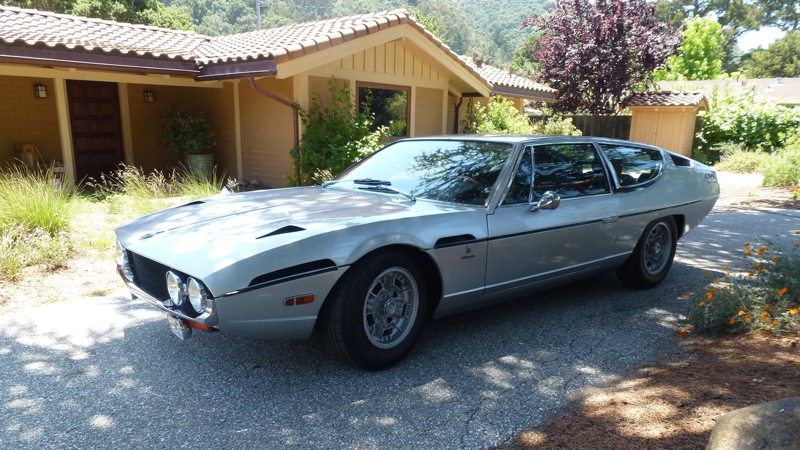 Silver-blue 1971 Lamborghini Espada Series II, front three-quarter view