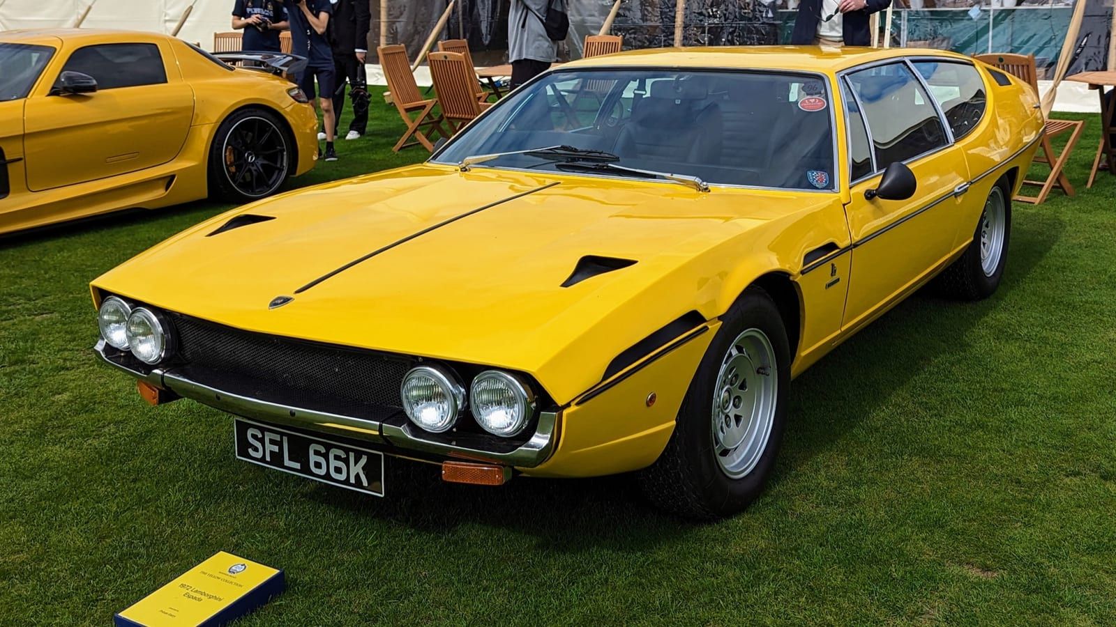 Yellow 1972 Lamborghini Espada, front three-quarter view