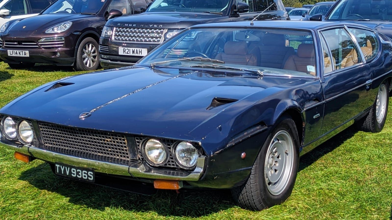 Dark-blue 1977 Lamborghini Espada Series III, front three-quarter view