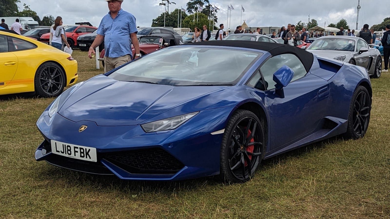 Blue 2018 Lamborghini Huracan Spyder, front three-quarter view