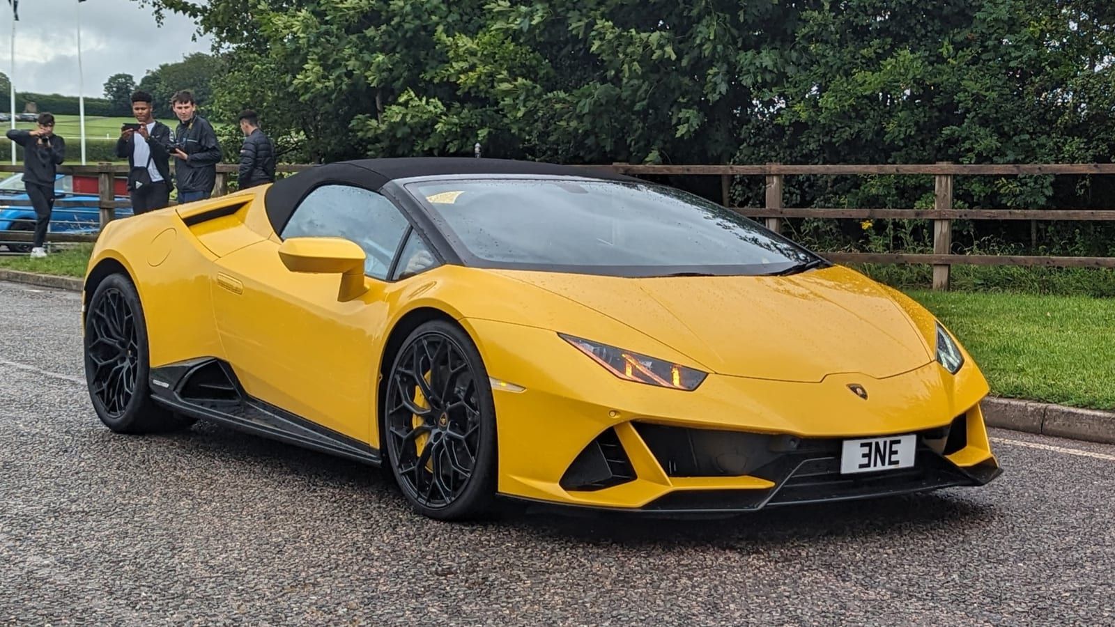 Yellow 2023 Lamborghini Huracan EVO Spyder, front three-quarter view