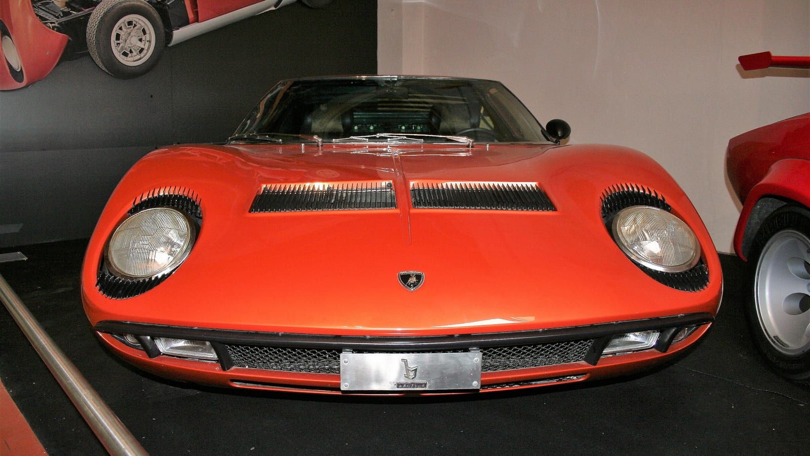 Red 1970 Lamborghini Miura P400 S, front view