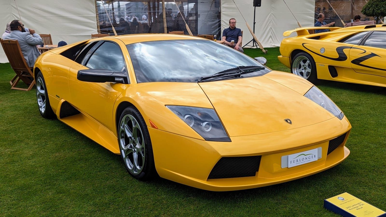 Yellow 2003 Lamborghini Murcielago coupe, front three-quarter view