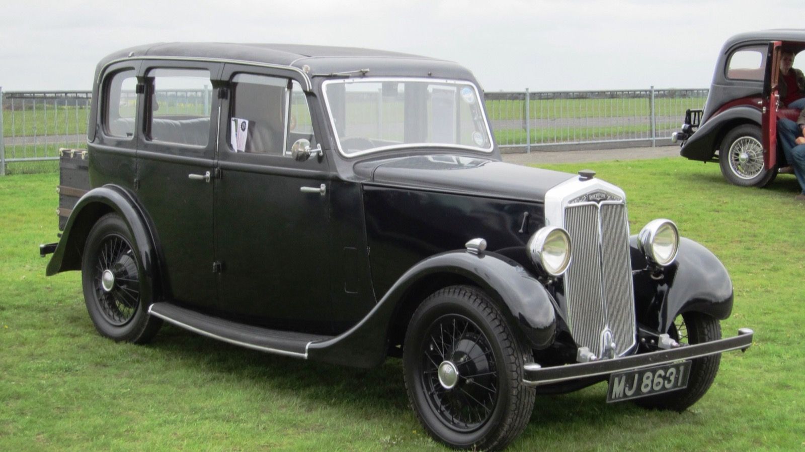 Black 1,203 cc Lanchester Ten saloon first registered in December 1935, front three-quarter view