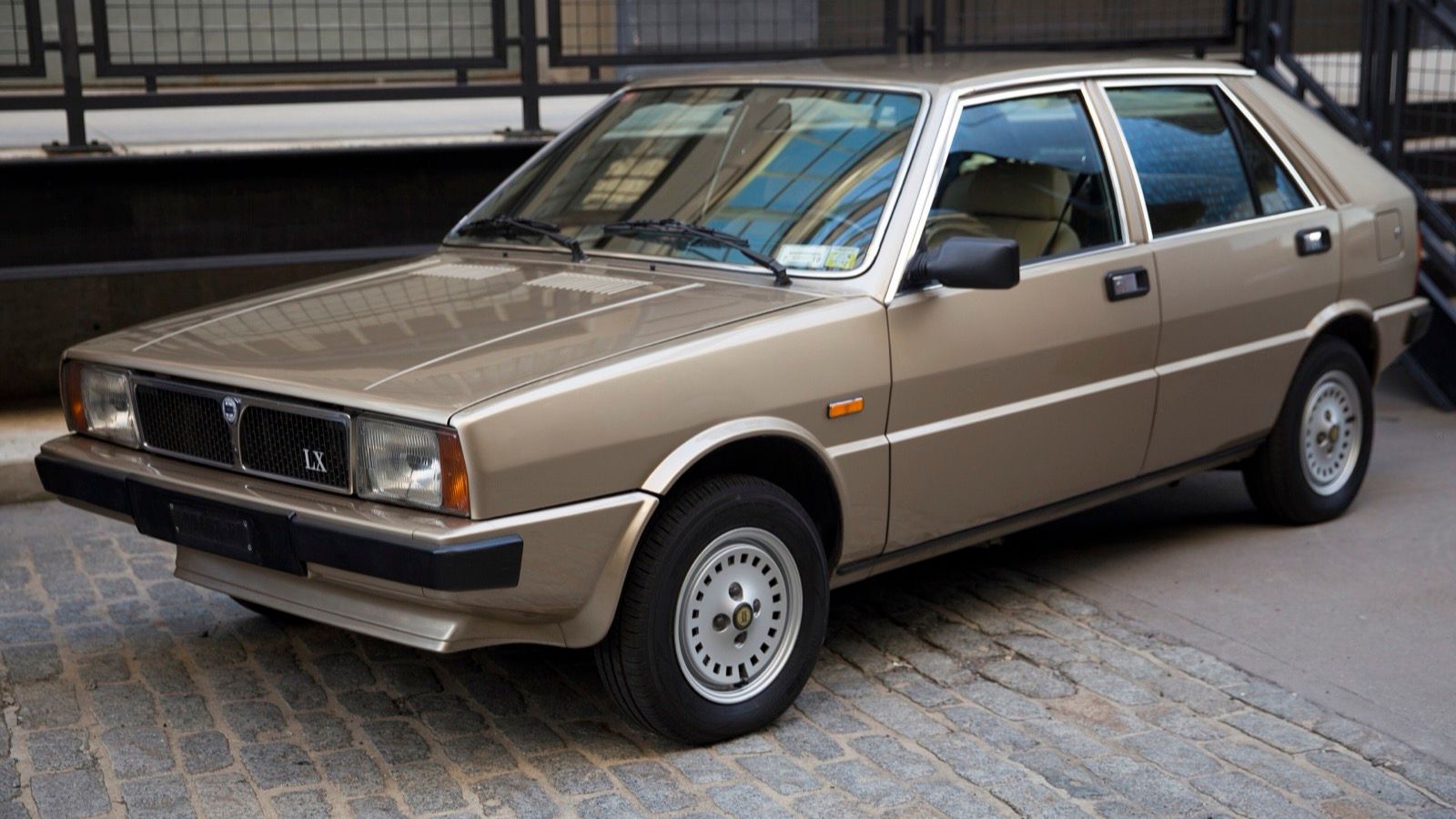 Beige 1982 Lancia Delta 1500 LX hatchback, front three-quarter view