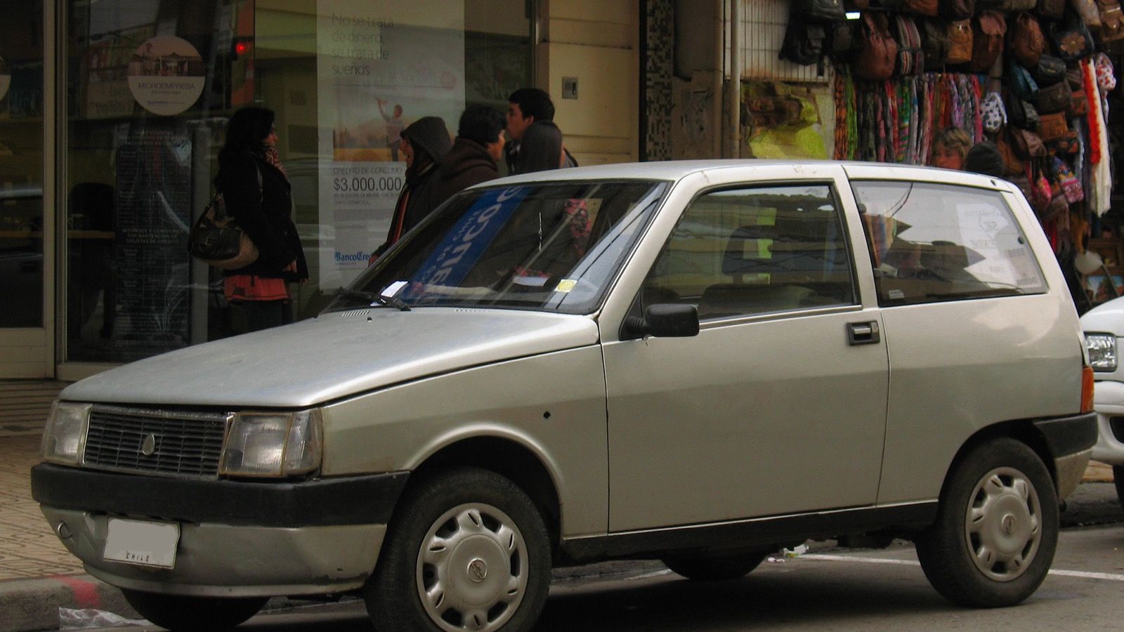 Silver 1989 Lancia Y10 Fire city car parked on a street, front three-quarter view