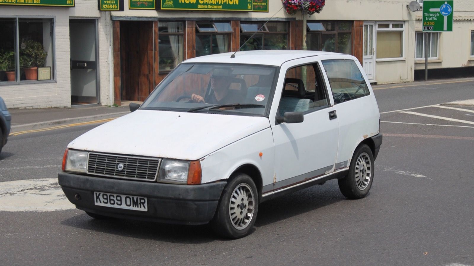 White 1992 Lancia Y10 LX Selectronic on a British street, front three-quarter view