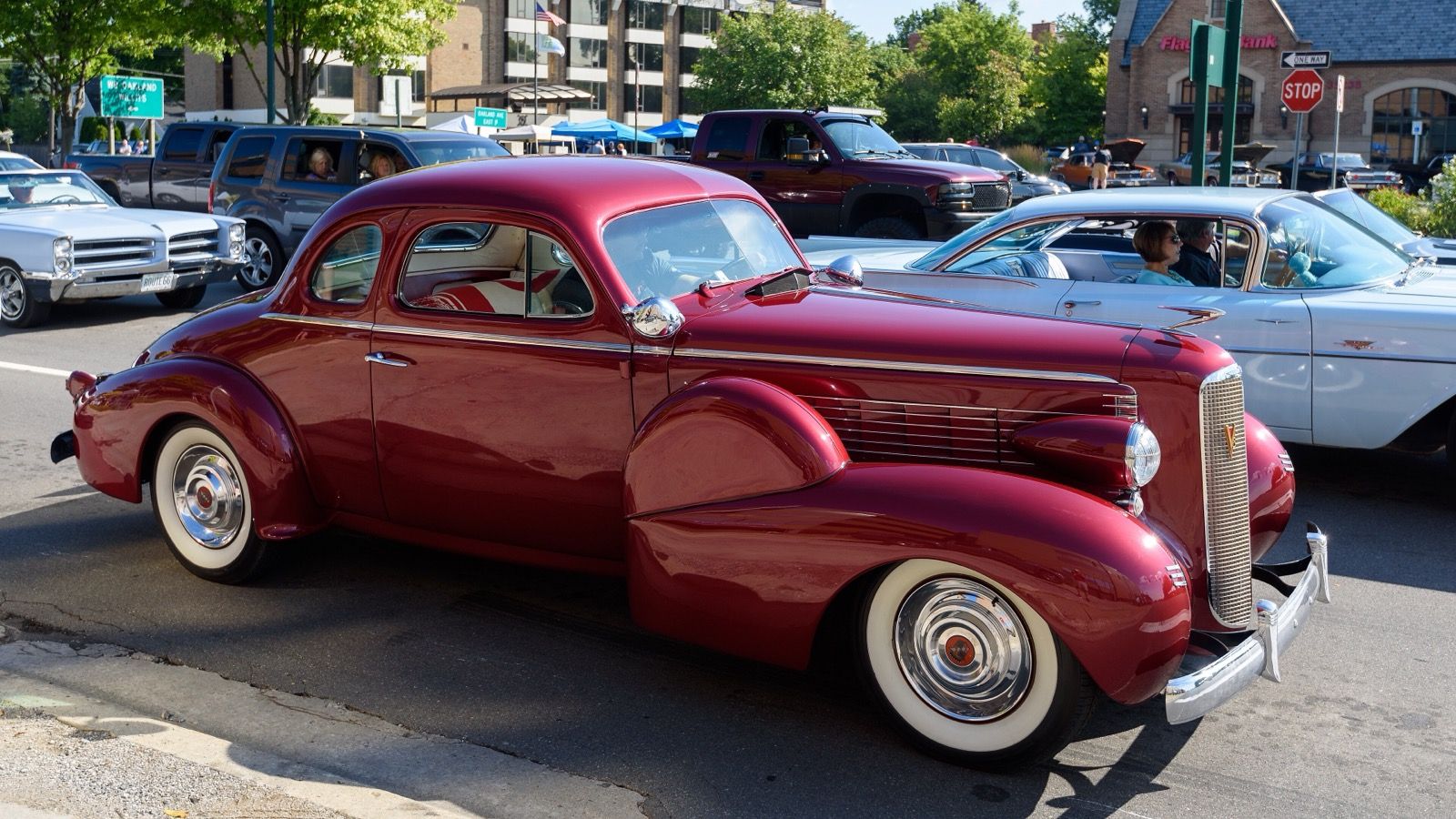 1937 LaSalle opera coupe in dark red, side profile view