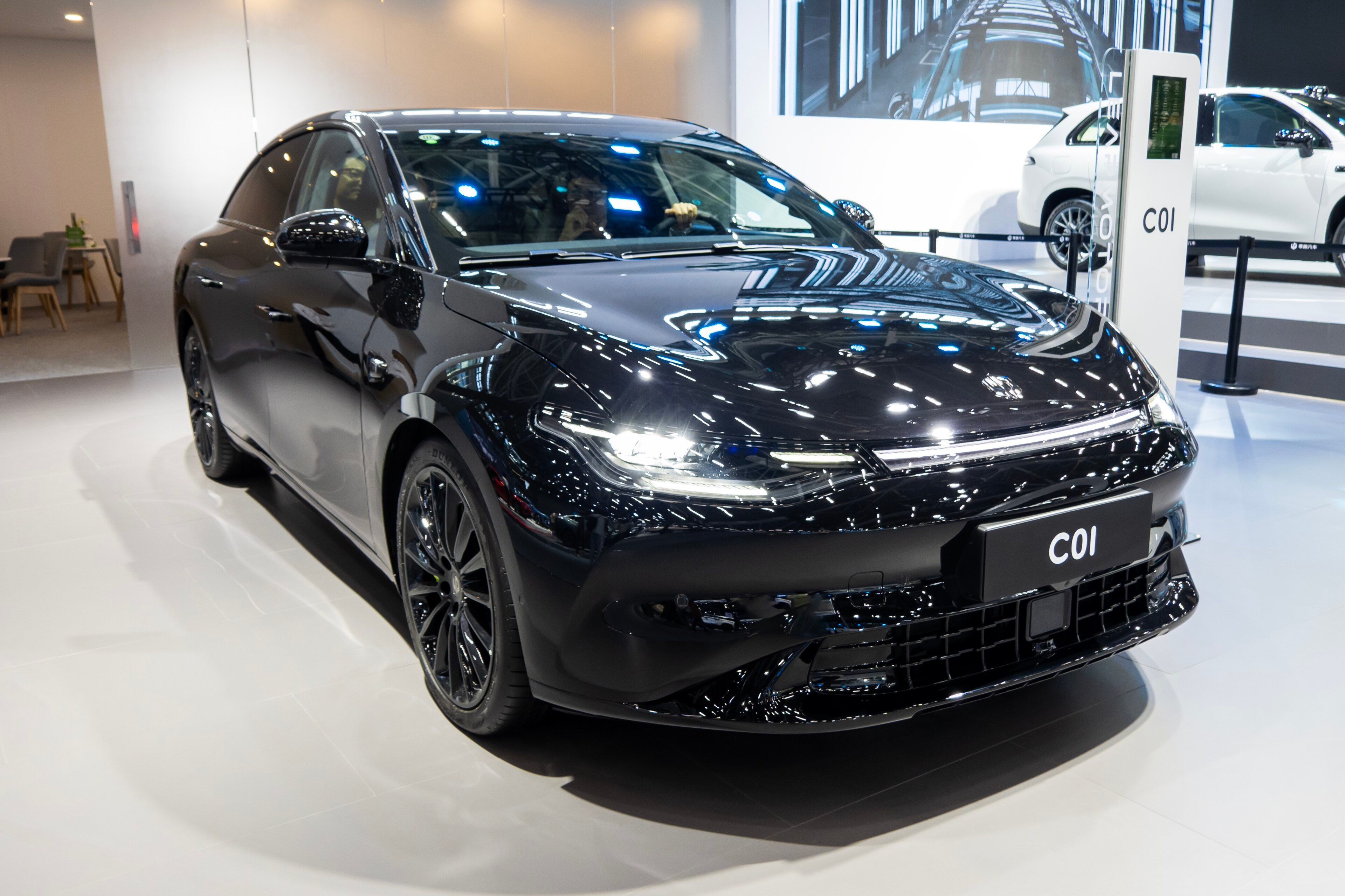 Black Leapmotor C01 electric saloon on display at Auto Guangzhou 2023, front three-quarter view
