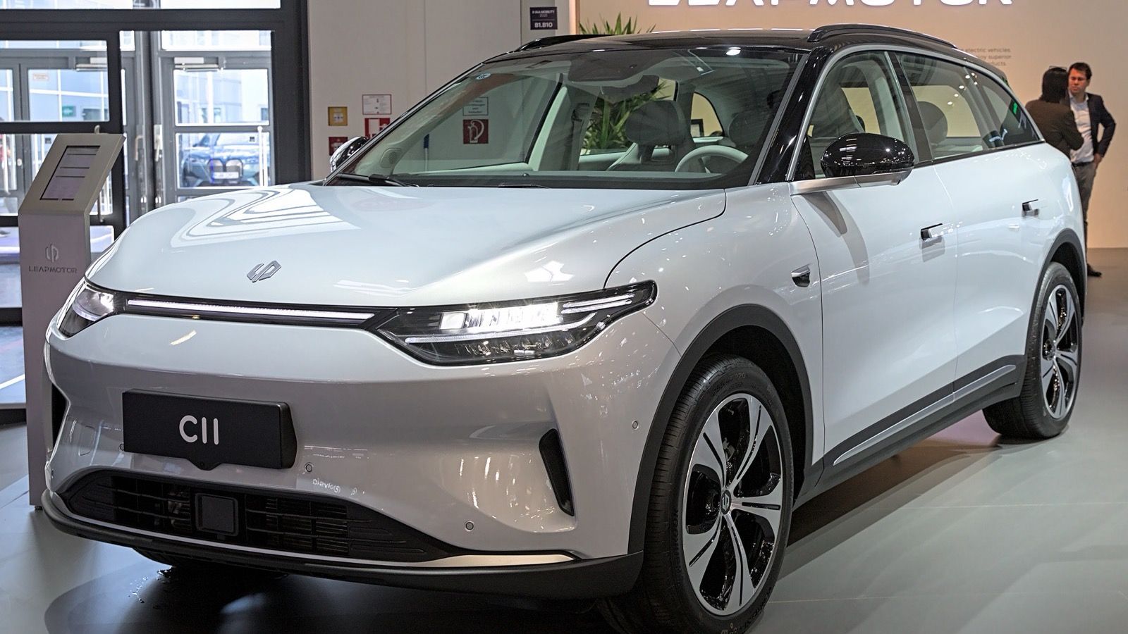 White Leapmotor C11 electric SUV on the Leapmotor stand at the IAA 2023, front three-quarter view