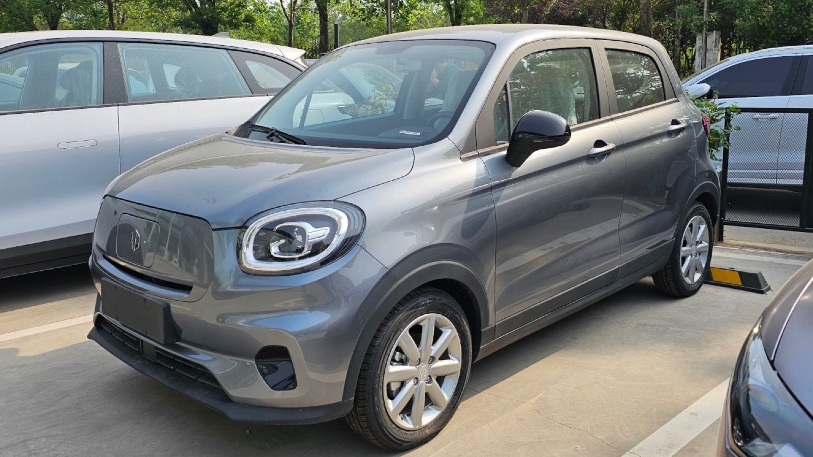 Grey 2023 Leapmotor T03 electric city car parked in China, front three-quarter view