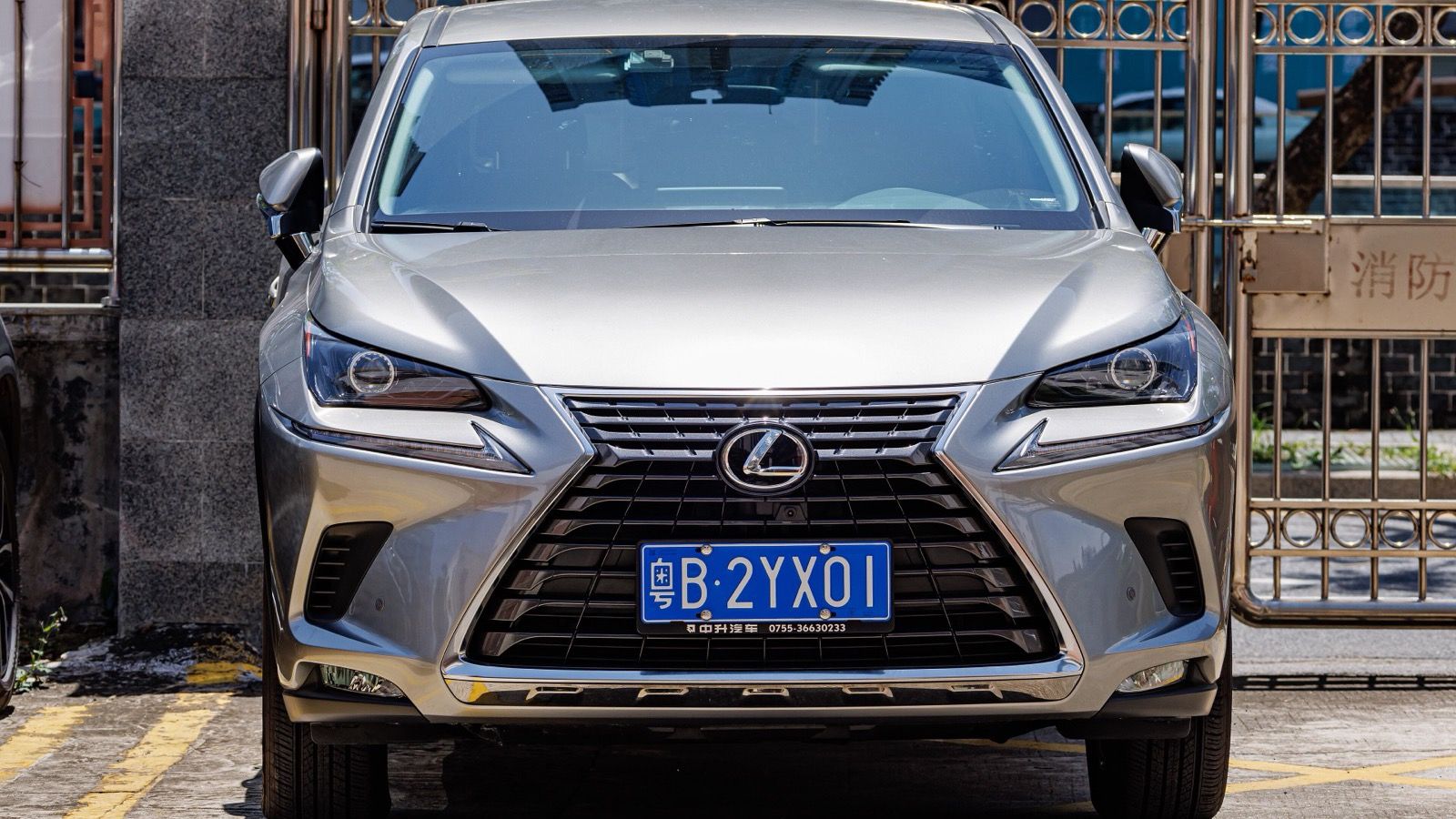 Silver first-generation Lexus NX compact crossover, front view