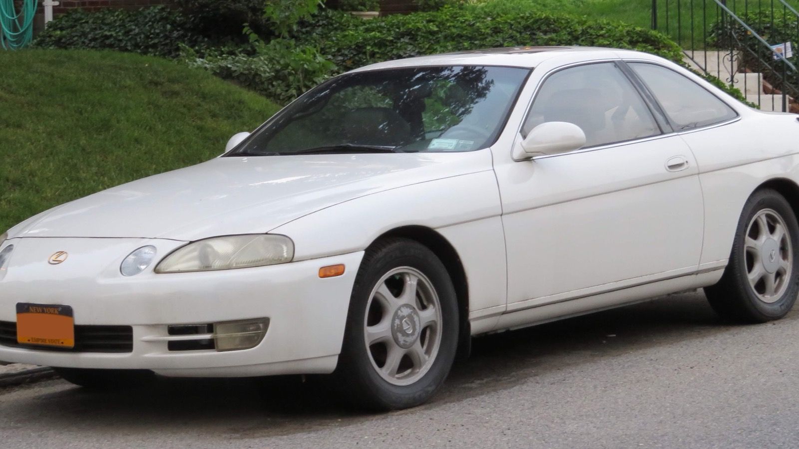 White 1996 Lexus SC 300 coupe at the kerb, front three-quarter view