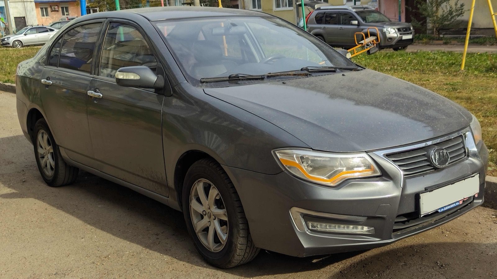 Dark grey Lifan 630 Solano sedan, front three-quarter view