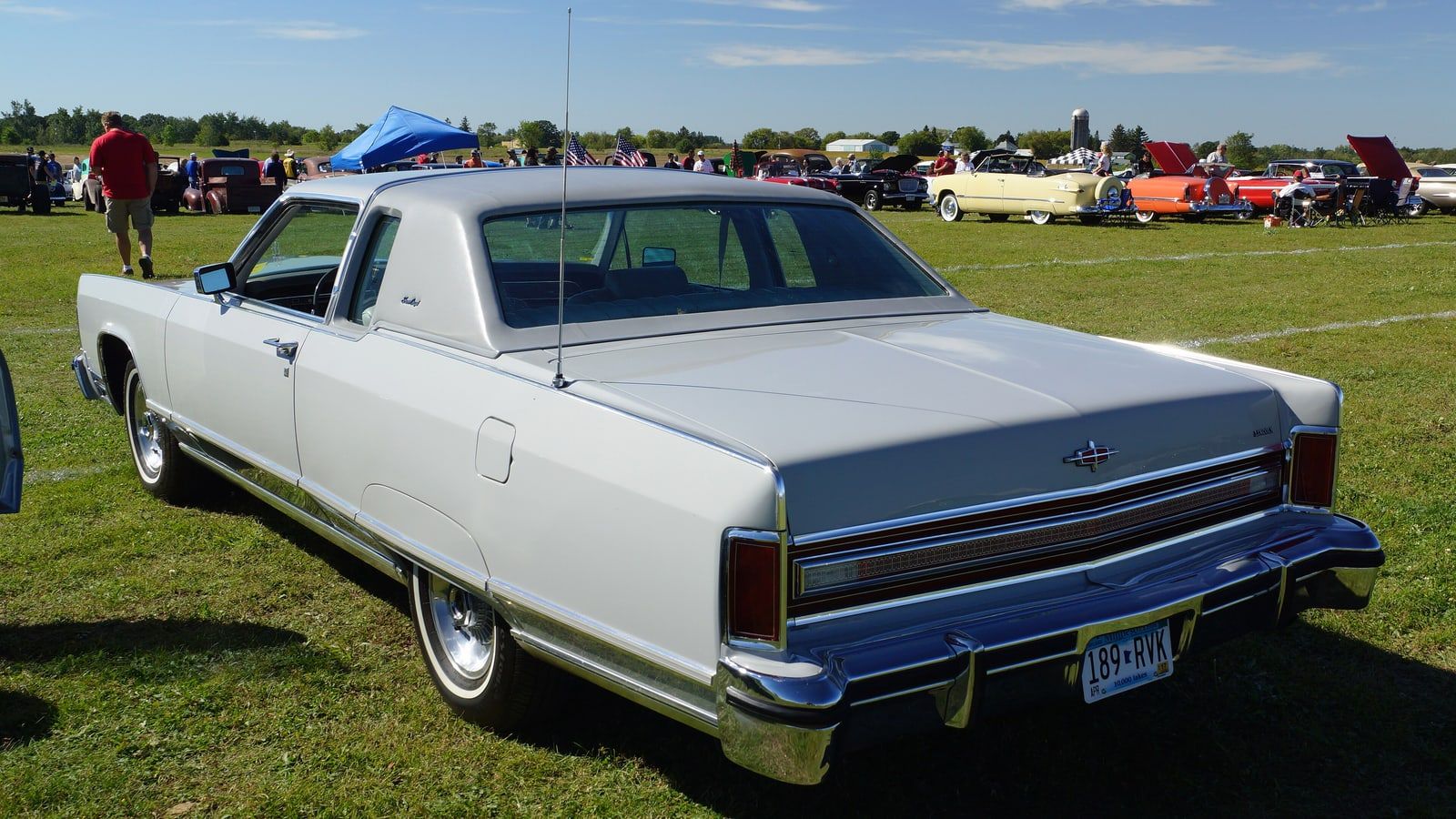 White 1977 Lincoln Continental Town Coupe, rear three-quarter view on grass