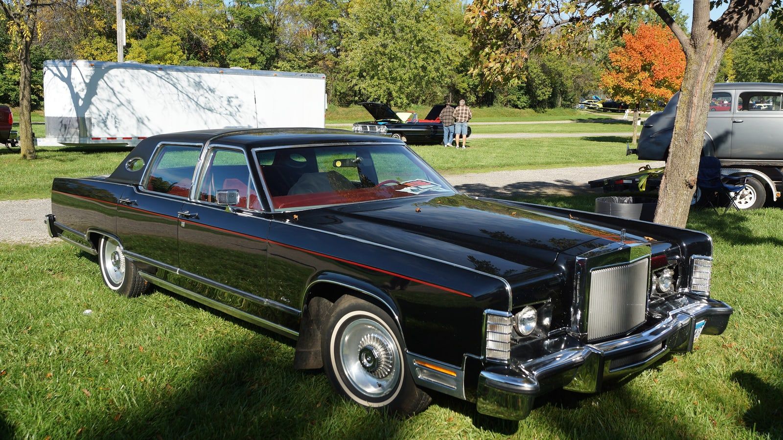 Black 1979 Lincoln Continental Town Car sedan, front three-quarter view on grass