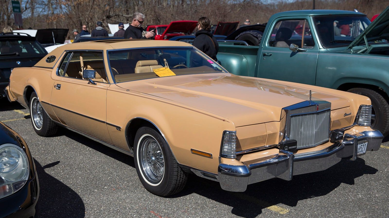 Maize yellow 1974 Lincoln Continental Mark IV coupe, front three-quarter view