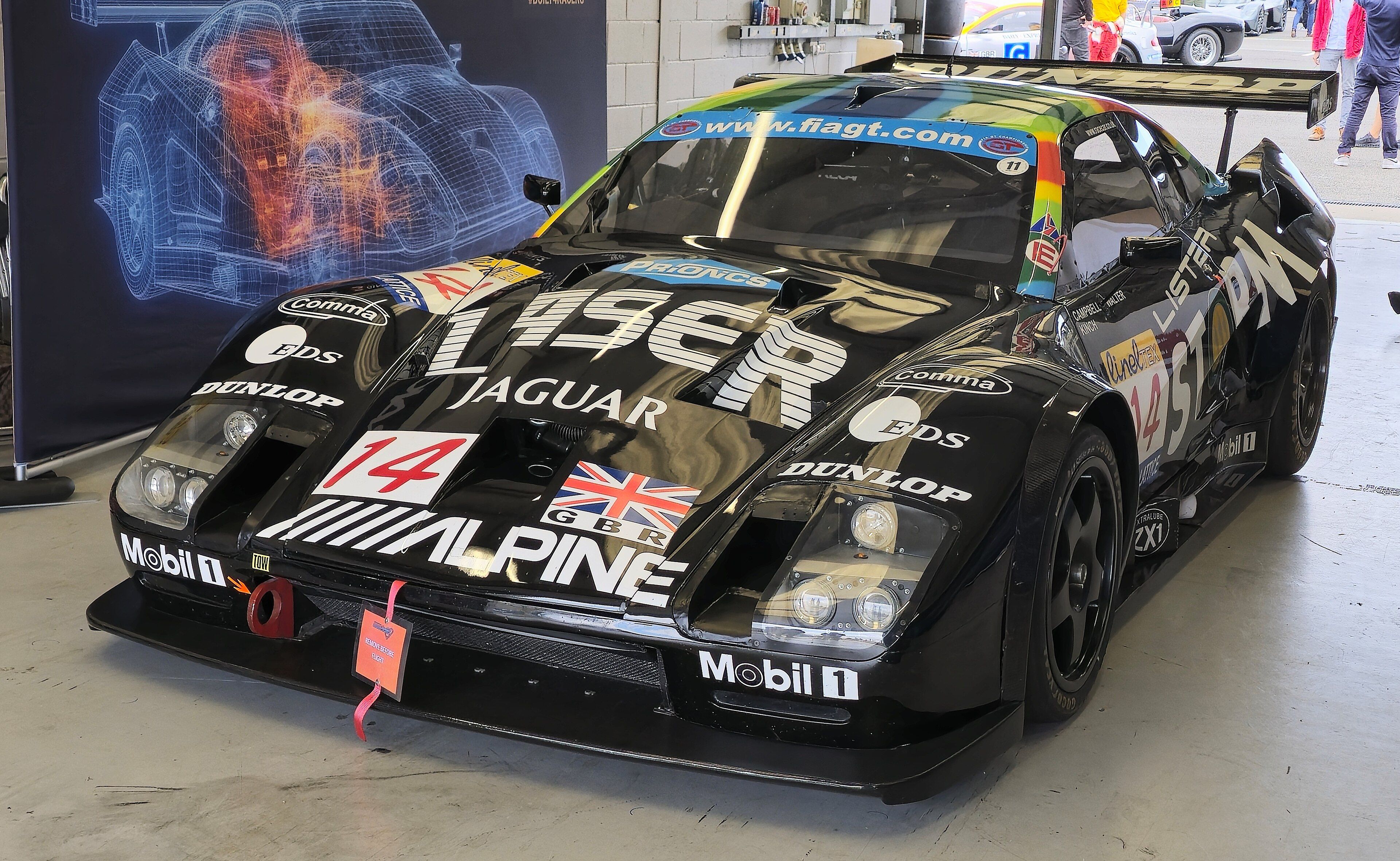 Black Lister Storm GTS race car in FIA GT livery, front three-quarter view