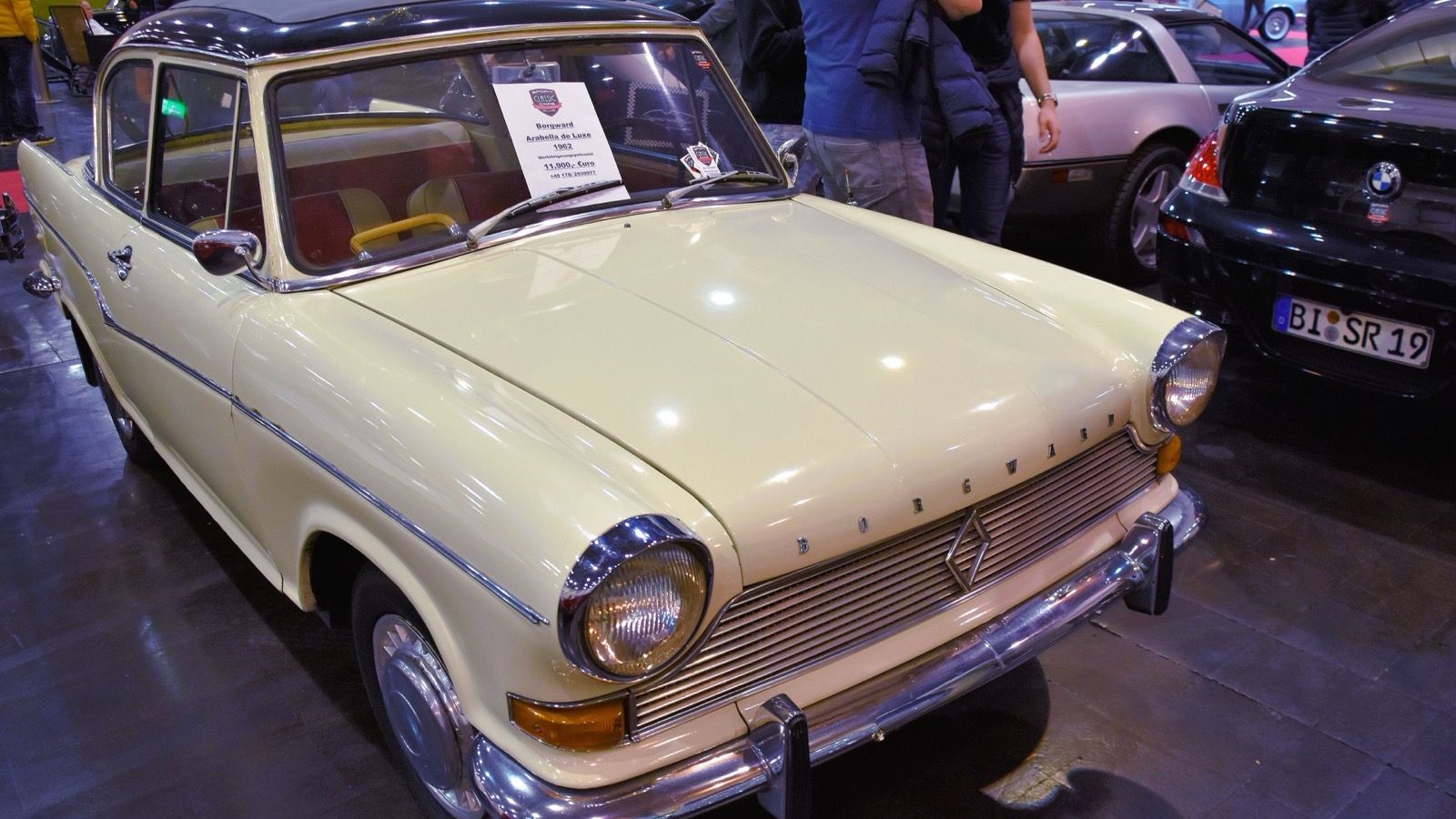 Cream 1962 Borgward Arabella de Luxe with dark roof at an indoor classic car show, front three-quarter view