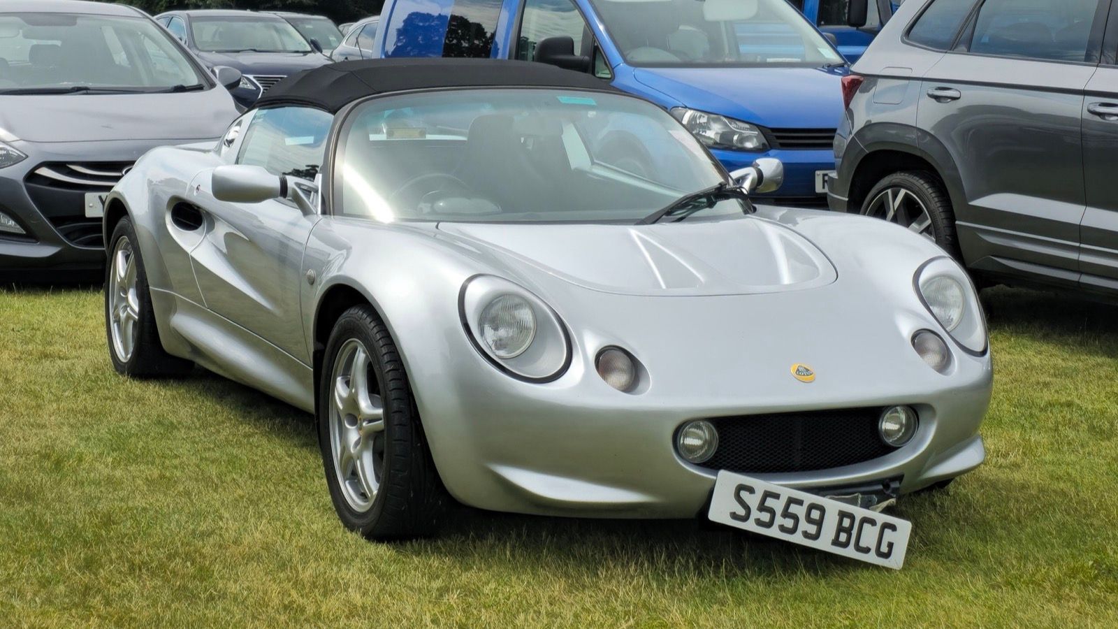 Silver 1998 Lotus Elise Series 1, front three-quarter view.