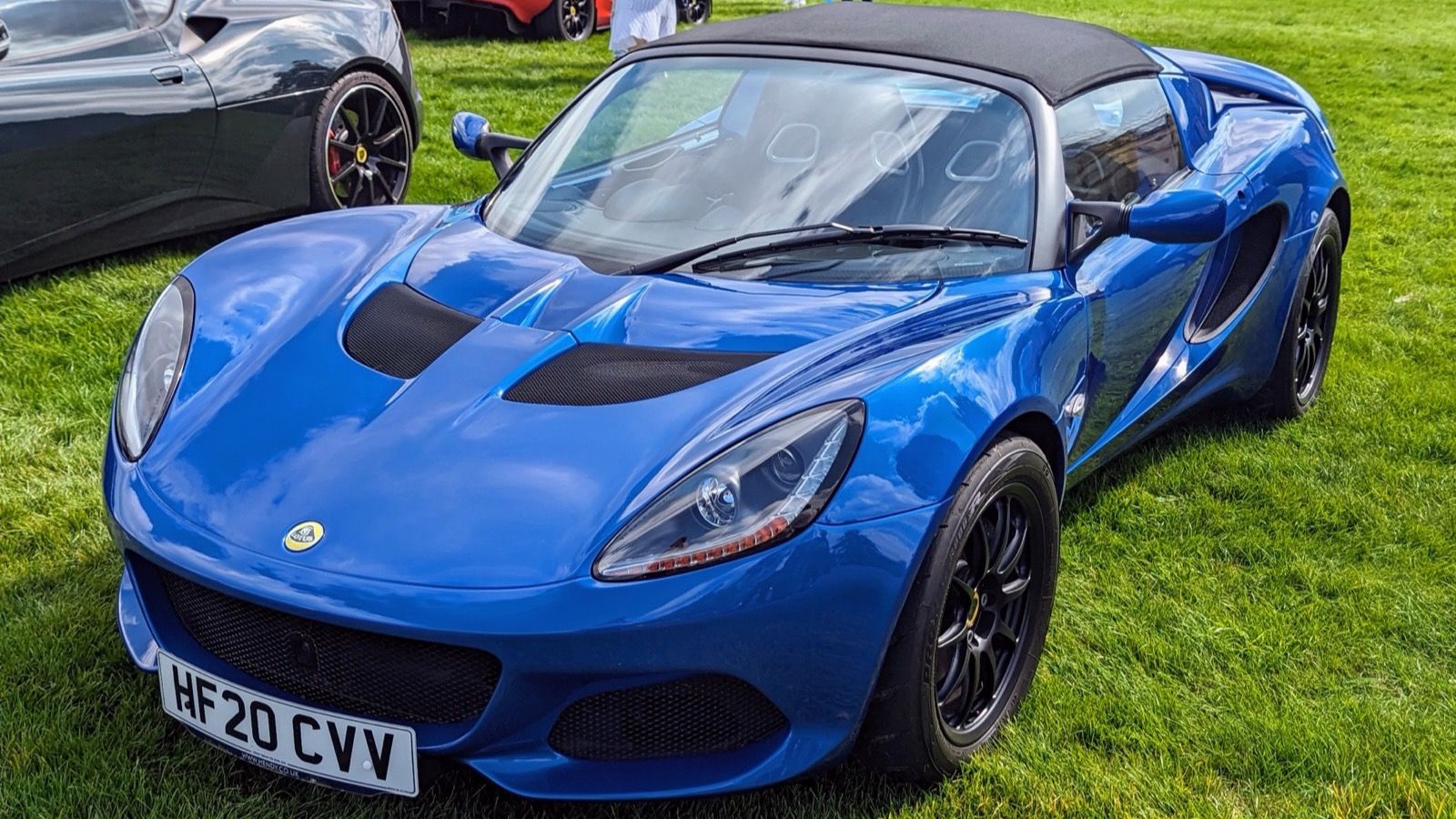 Blue 2020 Lotus Elise, front three-quarter view.