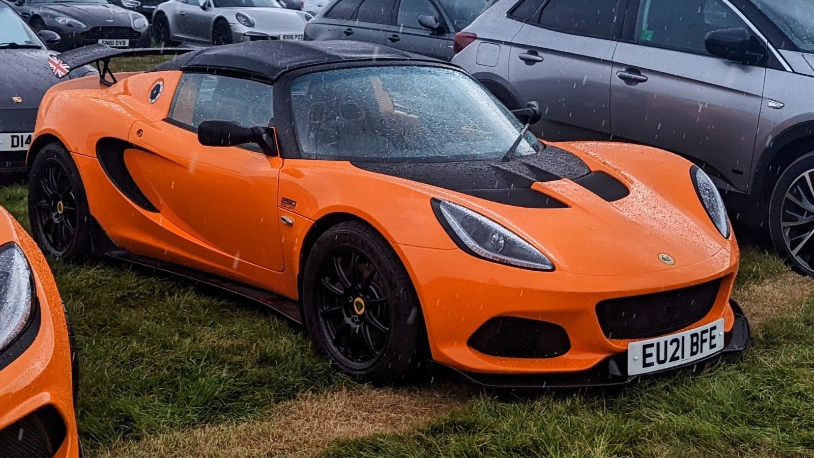 Orange 2021 Lotus Elise Cup 250, front three-quarter view.